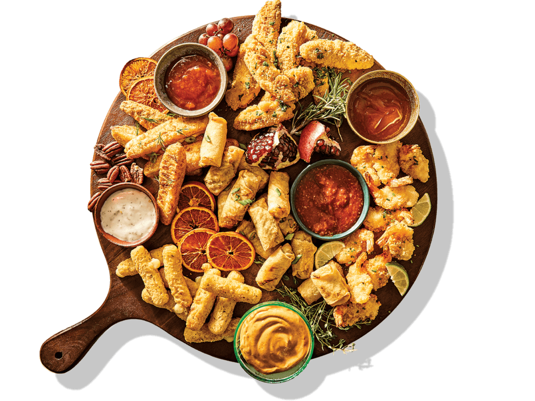 Collection of M&M foods and sauces on a platter.