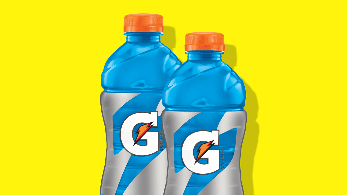 Gatorade sports drink bottles with yellow background.
