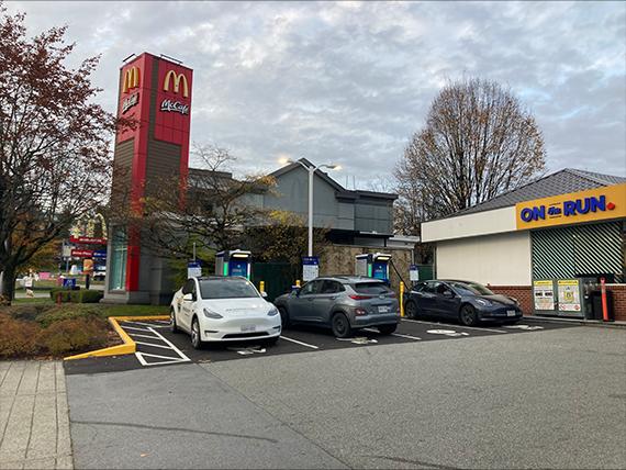 EV charging location next to ON the RUN. McDonald's in the background.